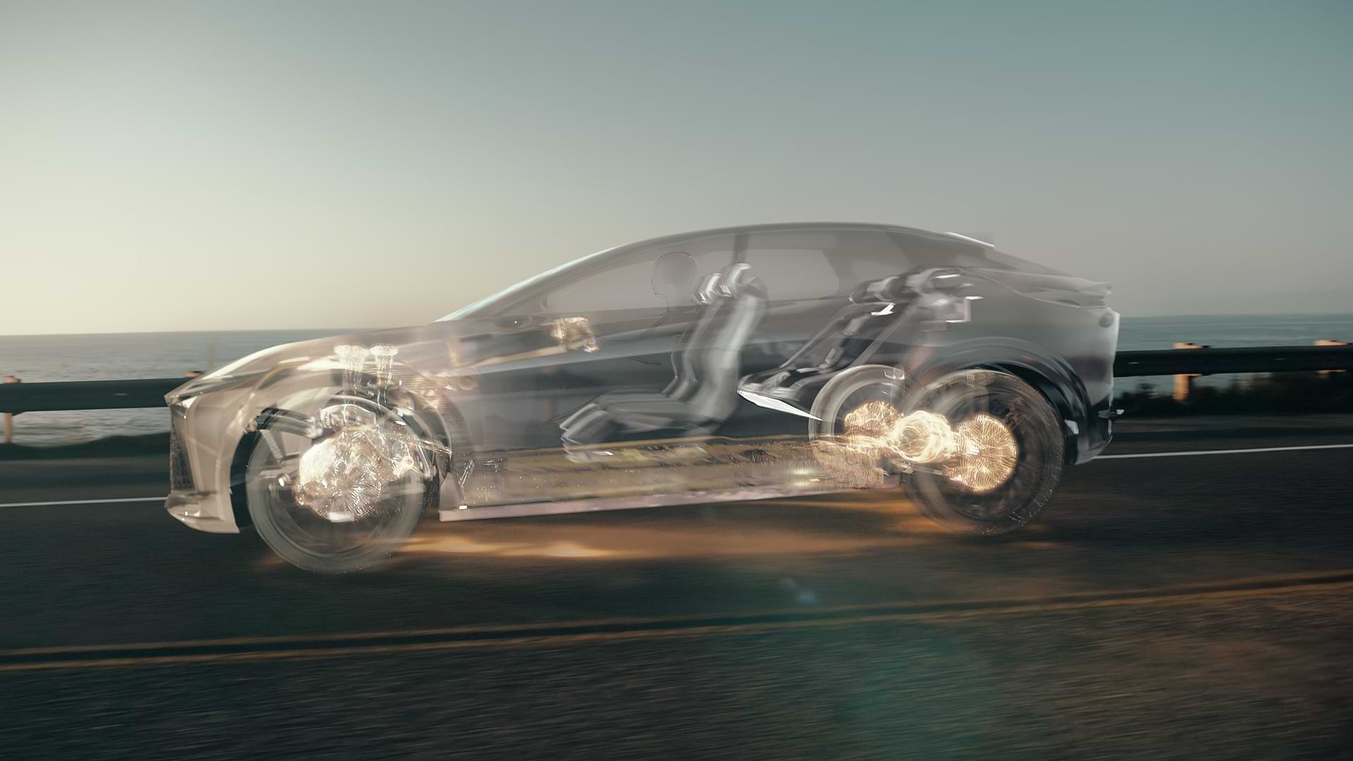 A see-through version of the Lexus LF-Z concept vehicle drives across a road - lit up to illuminate the DIRECT4 Drive Technology.